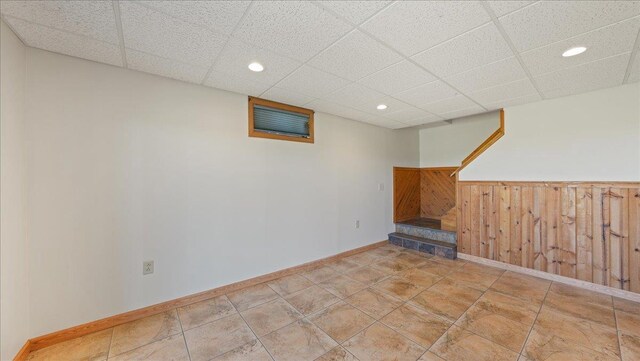 W9037 Ridgeview Trl, New Lisbon, WI 53950 - finished below grade area with a paneled ceiling, a wainscoted wall, recessed lighting, and baseboards