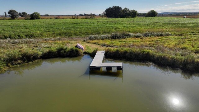 W9037 Ridgeview Trl, New Lisbon, WI 53950 - dock with a rural view and a water view