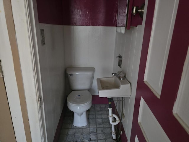 bathroom with toilet and sink