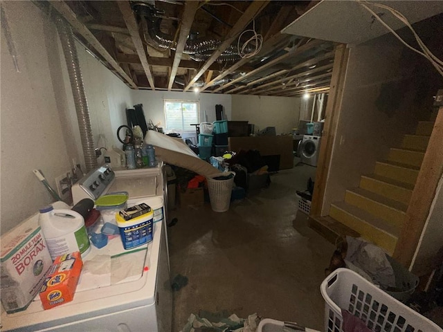 basement with washer and clothes dryer