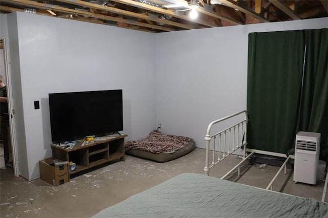 bedroom with concrete floors