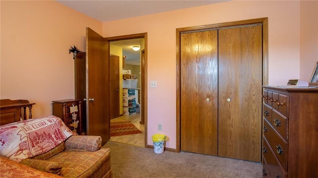 carpeted bedroom with a closet