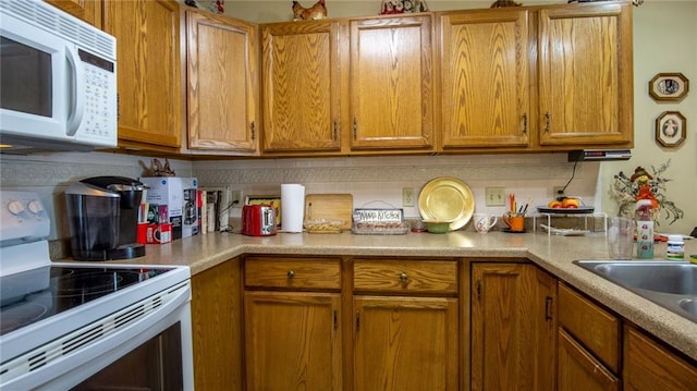 kitchen featuring white appliances