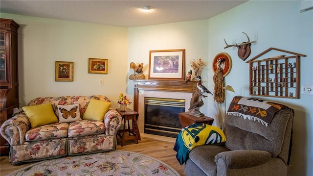 living area with light hardwood / wood-style flooring