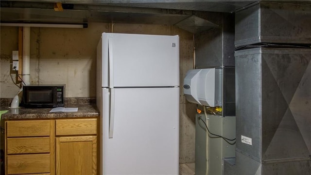 kitchen featuring white fridge