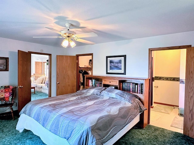 63574 Lohmann Ln, Eastman, WI 52626 - bedroom featuring carpet, a spacious closet, and ensuite bathroom