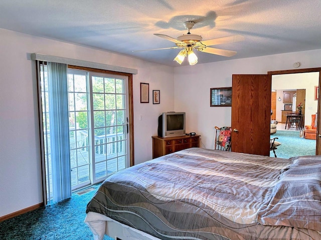 63574 Lohmann Ln, Eastman, WI 52626 - bedroom featuring carpet floors, access to exterior, baseboards, and ceiling fan
