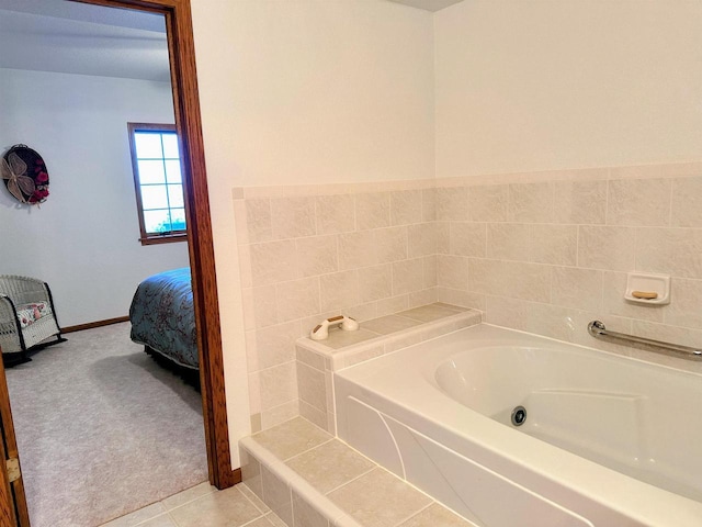 63574 Lohmann Ln, Eastman, WI 52626 - ensuite bathroom with a bath, tile patterned floors, and baseboards
