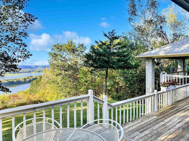 63574 Lohmann Ln, Eastman, WI 52626 - deck with a yard and a water view