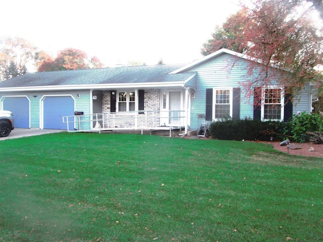 single story home with covered porch, a garage, and a front lawn