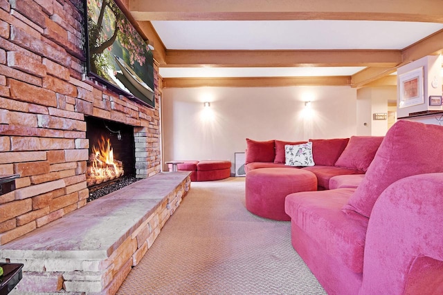 living room with a fireplace, beamed ceiling, and carpet floors