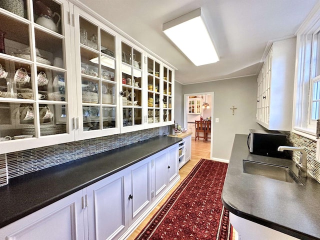 interior space featuring light hardwood / wood-style floors and sink