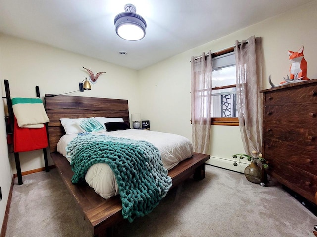 bedroom featuring carpet and a baseboard radiator