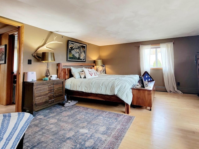 bedroom with light wood-type flooring