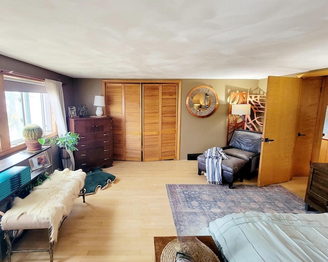 bedroom with light hardwood / wood-style floors