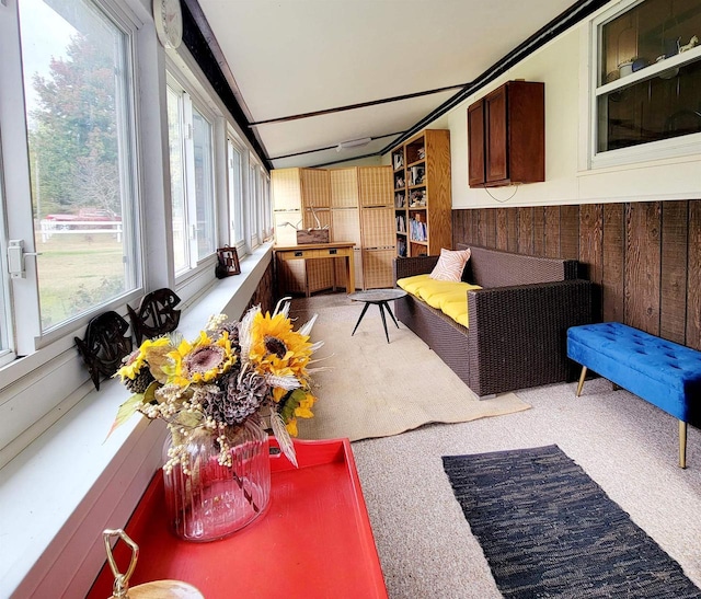 sunroom / solarium with lofted ceiling