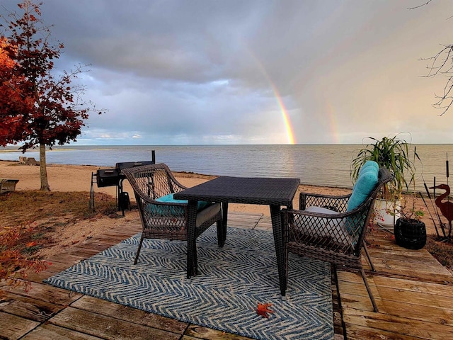 patio terrace at dusk with a water view