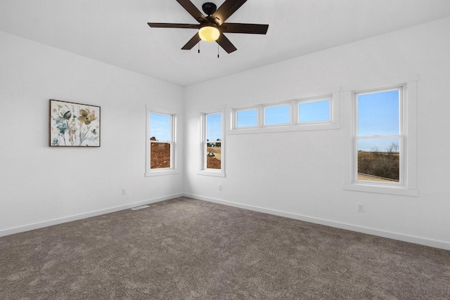 W4946 Battlestone Station Rd Unit 23, La Crosse, WI 54601 - carpeted spare room featuring baseboards and ceiling fan