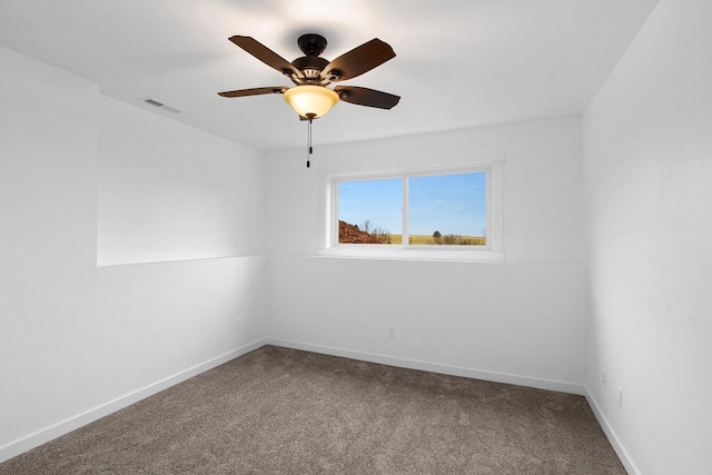 W4946 Battlestone Station Rd Unit 23, La Crosse, WI 54601 - carpeted spare room with visible vents, baseboards, and ceiling fan