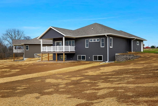 W4946 Battlestone Station Rd Unit 23, La Crosse, WI 54601 - rear view of property with a wooden deck
