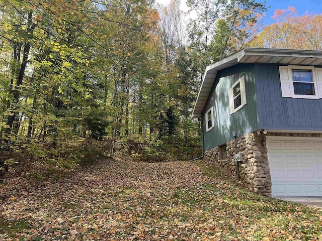 view of home's exterior with a garage