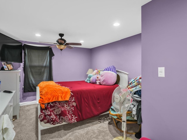 bedroom with light colored carpet and ceiling fan