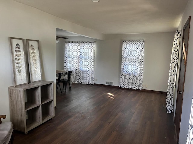 entryway with dark wood-type flooring