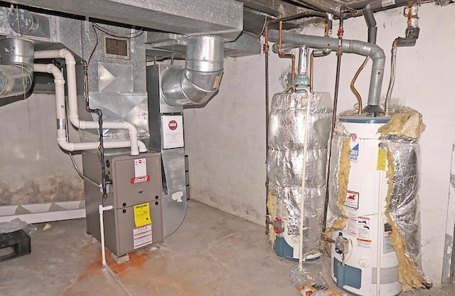 utilities featuring gas water heater and heating unit