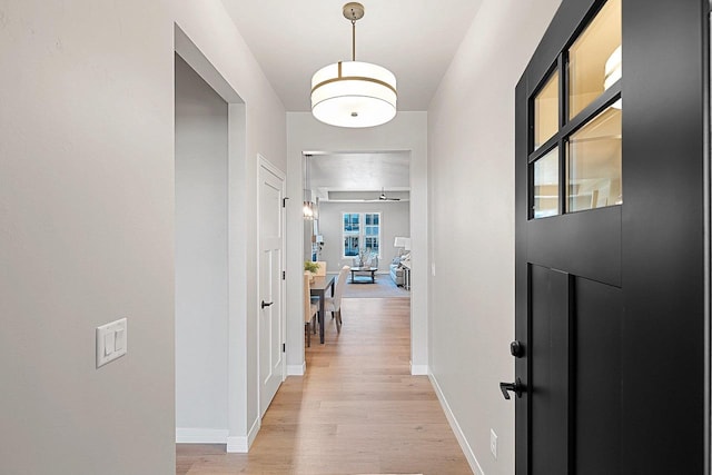 hallway featuring light hardwood / wood-style flooring