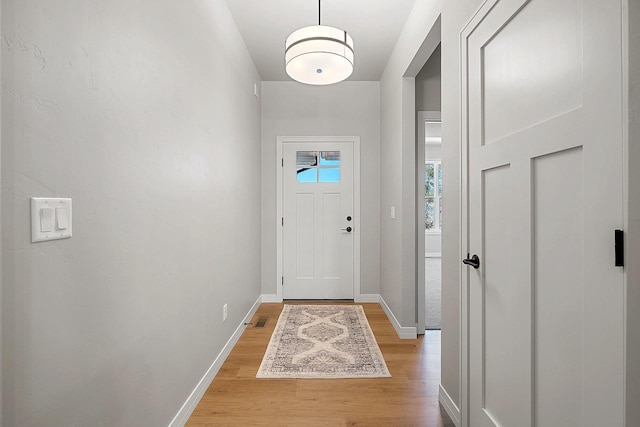 doorway featuring light wood-type flooring