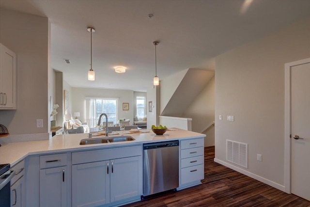 kitchen featuring dark wood-style flooring, open floor plan, visible vents, dishwasher, and a sink