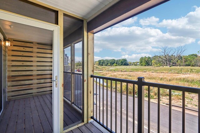 balcony featuring a rural view