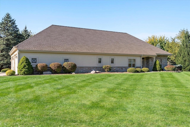 view of home's exterior featuring a yard