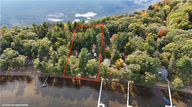 6874N Victory Heights Cir, Stone Lake, WI 54876 - aerial view of property and surrounding area featuring a heavily wooded area, a large body of water, and property boundaries highlighted