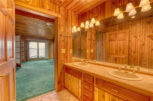 6874N Victory Heights Cir, Stone Lake, WI 54876 - full bath with wooden walls, double vanity, wooden ceiling, and tile patterned flooring
