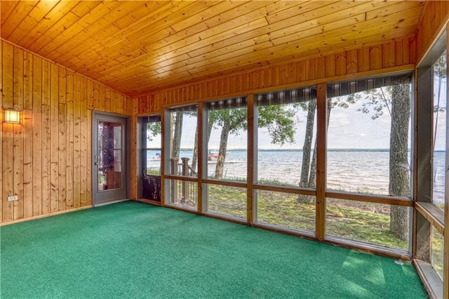 6874N Victory Heights Cir, Stone Lake, WI 54876 - unfurnished sunroom with a water view, wood ceiling, lofted ceiling, carpet floors, and wooden walls