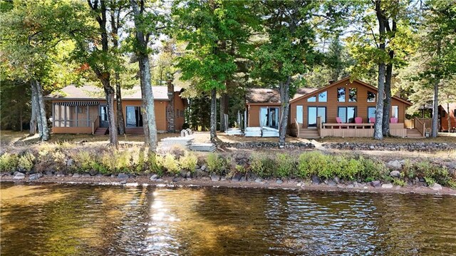 6874N Victory Heights Cir, Stone Lake, WI 54876 - rear view of property with a deck with water view