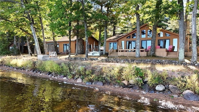 6874N Victory Heights Cir, Stone Lake, WI 54876 - rear view of property with a deck with water view