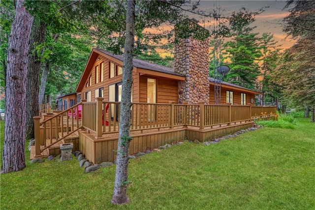 6874N Victory Heights Cir, Stone Lake, WI 54876 - wooden deck featuring a yard