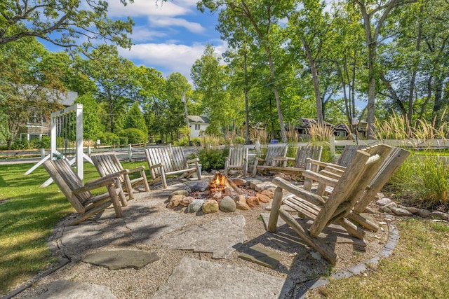 exterior space featuring an outdoor fire pit