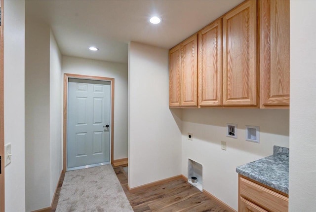 425 Mourning Dove Ct, Arena, WI 53503 - laundry area with electric dryer hookup, cabinet space, hookup for a washing machine, baseboards, and light wood-type flooring