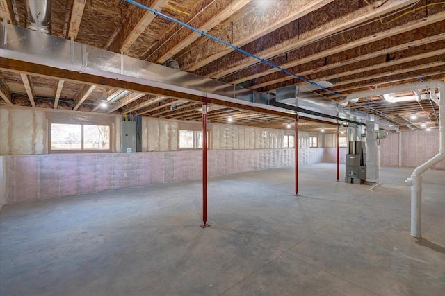425 Mourning Dove Ct, Arena, WI 53503 - below grade area with plenty of natural light, electric panel, and heating unit
