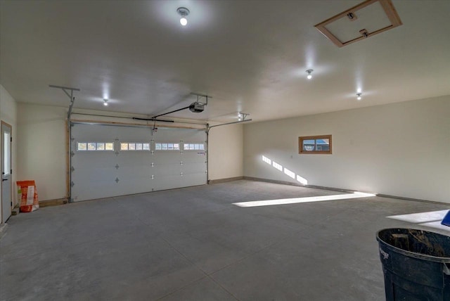 425 Mourning Dove Ct, Arena, WI 53503 - garage with a garage door opener and baseboards