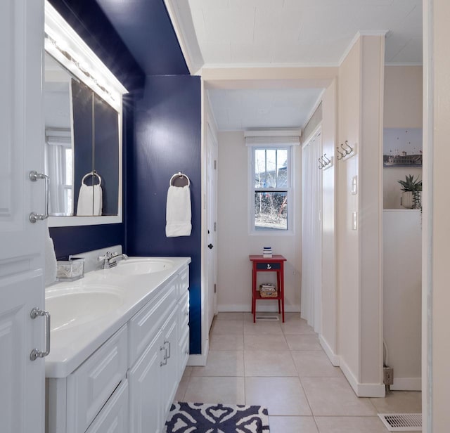 N1814 Highland Rd, Lake Geneva, WI 53147 - full bathroom with tile patterned floors, double vanity, ornamental molding, and baseboards