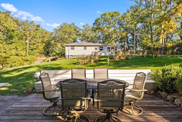 N1814 Highland Rd, Lake Geneva, WI 53147 - deck with outdoor dining space and a yard