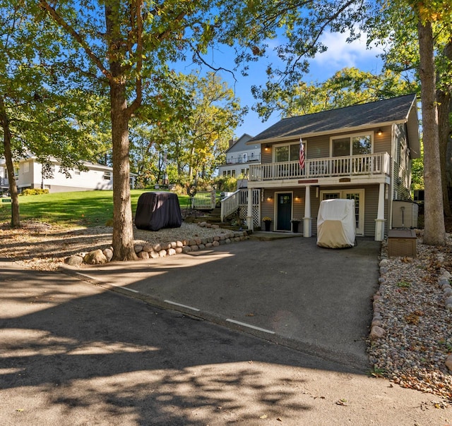 N1814 Highland Rd, Lake Geneva, WI 53147 - view of front of home with a wooden deck and stairway