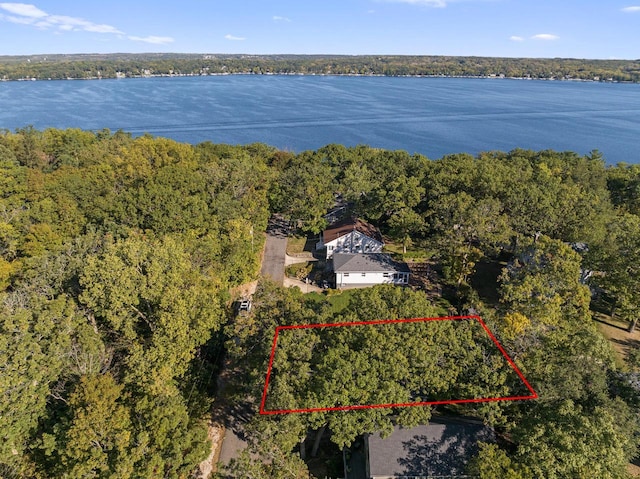 N1814 Highland Rd, Lake Geneva, WI 53147 - view of subject property featuring a forest, a nearby body of water, and property boundaries highlighted