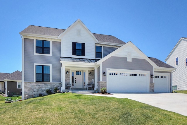 view of front facade with a garage and a front yard