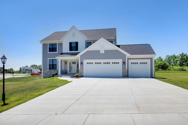 view of front facade featuring a front lawn and a garage