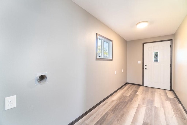 entryway with light hardwood / wood-style flooring